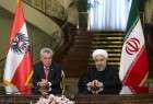 الرئيسان روحاني وفيشر يؤكدان تعزيز العلاقات الثنائية