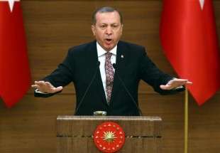 Turkish President Erdogan threatens top court over freed journalists