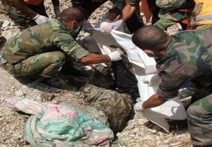 العثور على مقبرة جماعية تضم جثامين 31 شهيدا في محيط مطار تدمر