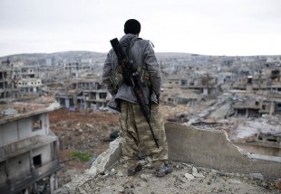 Syrian Kurds warn Turkey against atrocities on Kobani