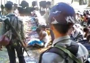 Footage shows Myanmar police beating Rohingya Muslims