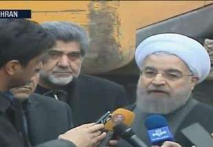 Iranian president visits  site of collapsed Plasco