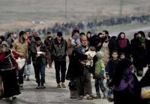 Les civils laissent la place aux combats contre les insurgés en Syrie et en Irak