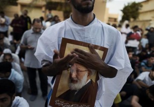 Bahrainis stage demo in shrouds ahead of cleric’s trial