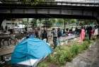 Migrants de France sans abri camperaient dans les rues