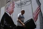 Des graffitis de Donald Trump dessinés sur la barrière de séparation israélienne
