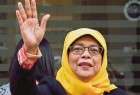 Singapore elects first female president