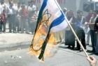 آتش زدن پرچم اسرائیل در عمان نشانه بیدار بودن امت اسلامی است