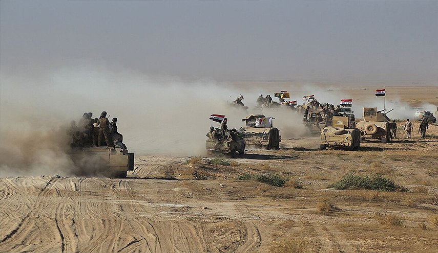 مواجهات عنيفة للجيش العراقي  والحشد الشعبي ضد 