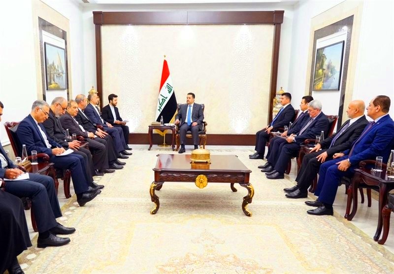 وزير الخارجية الايراني يلتقي رئيس الوزراء العراقي