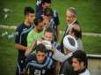 Andranik "Ando" Teymourian, Iranian-Armenian member of Iran national football team is seen off for UAE by prayer leader of the team.