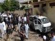 Pakistani security forces gather at the site of a bomb explosion in southwest city of Quetta on August 8, 2013.