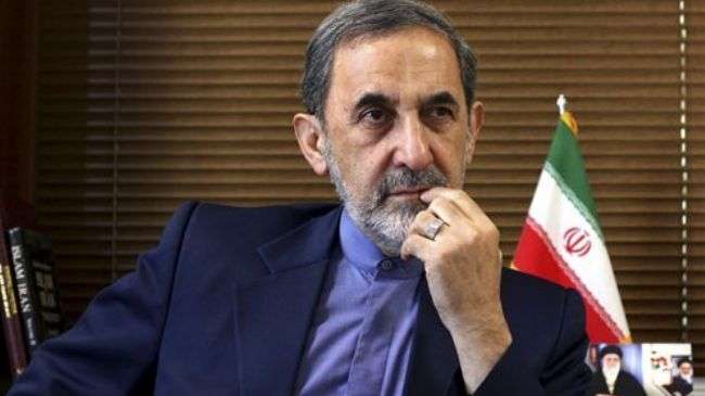 Ali Akbar Velayati, a top adviser to Leader of the Islamic Revolution Ayatollah Seyyed Ali Khamenei, speaks during an exclusive interview with The Associated Press at his office, in Tehran.