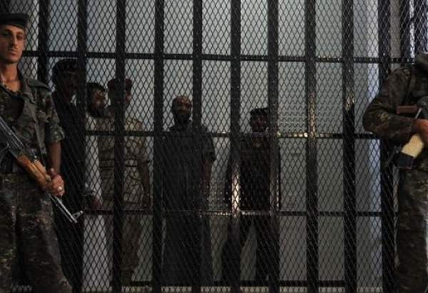 Bahraini security forces stand guard in prison