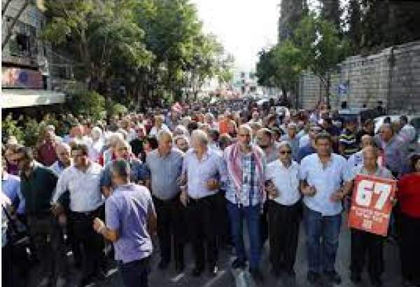 Palestinian residents of Nazareth demonstrate in condemnation of Israeli measures against Palestinian people