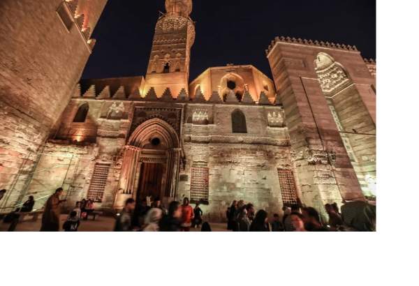 People gather illuminated Al-Azhar Mosque for upcoming month of Ramadan in Cairo, Egypt on March 13, 2023 [Mohamed El-Shahed – Anadolu Agency]