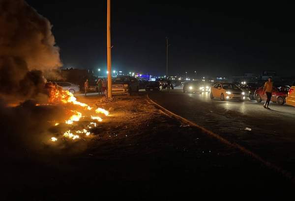 Group of people burn tires and block roads to protest Libya’s Foreign Minister’s meeting with Israeli Foreign Minister Eli Cohen in Tajura town of Tripoli, Libya on August 27, 2023 [ Hazem Turkia/Anadolu Agency]