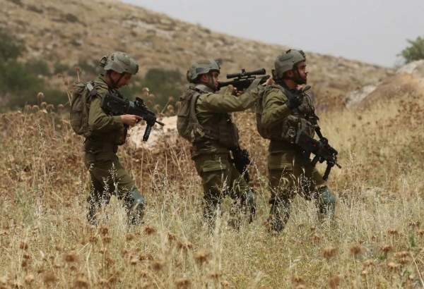 A large Israeli occupation army force raids Jenin refugee camp, arrests several people, some wounded