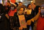 People gather to attend a pro-Palestinian candlelight vigil demonstration organized by Health Workers Alliance outside Consulate General of Israel in Toronto, Ontario, Canada on November 9, 2023. [Mert Alper Dervış – Anadolu Agency]