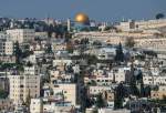 A picture taken from the West Bank town of Abu Dis, separated from Jerusalem by Israel’s controversial barrier, shows the Dome of the Rock (top) in Jerusalem’s al-Aqsa mosque compound and the Jewish cemetary of Mount of Olives (R), on 23 November 2020. [AHMAD GHARABLI/AFP via Getty Images]