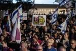 Thousands of Israelis rally in Tel Aviv, urge dissolution of parliament, early elections