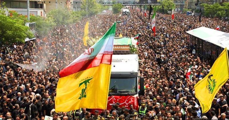 تقرير مصور ..  جموع مليونية في طهران تشييع جثامين الرئيس الشهيد ومرافقية  