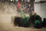 Passion play on displays Ashura event in Nushabad, Iran (photo)  