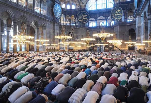 People attend funeral prayer in absentia for Hamas political chief Ismail Haniyeh, who was assassinated in Tehran, at Hagia Sophia Grand Mosque in Istanbul, Turkiye on August 2, 2024 [Cemal Yurttaş/Anadolu Agency]