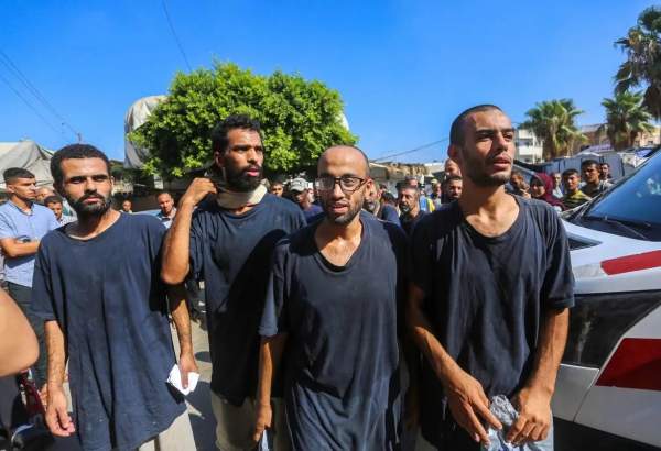 Palestinian prisoners, detained by the Israeli army, are taken to the al-Aqsa Martyrs Hospital for medical treatment, after being released by the Israeli forces in Deir al-Balah, Gaza on August 1, 2024 [Ashraf Amra/Anadolu Agency]