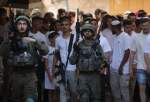 Illegal Israeli settlers escorted by security forces storm Old City of Hebron in southern West Bank