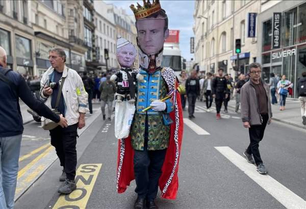 Thousands protest across France, demanding Macron