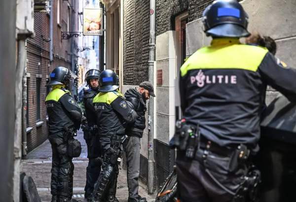 Police officers take security measures after they used force against protesters demonstrating to condemn the attribution of post-match incidents between Ajax and Maccabi Tel Aviv to pro-Palestinian supporters and to criticize the media’s stance in Amsterdam, Netherlands on November 10, 2024