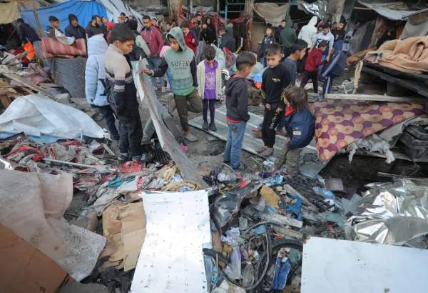 Israeli drone strike on school sheltering displaced Palestinians wounds at least 40